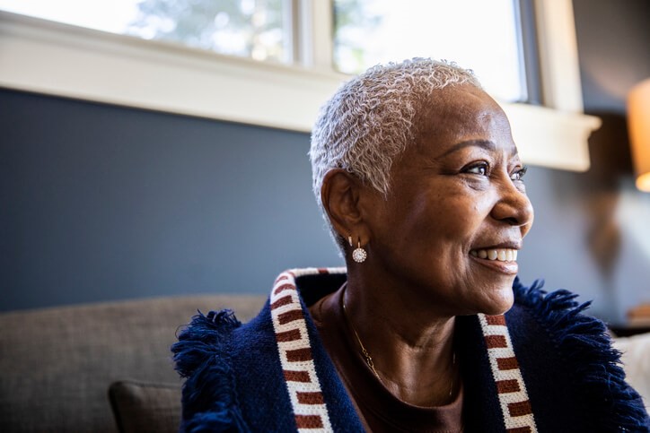 African American woman sitting on a couch