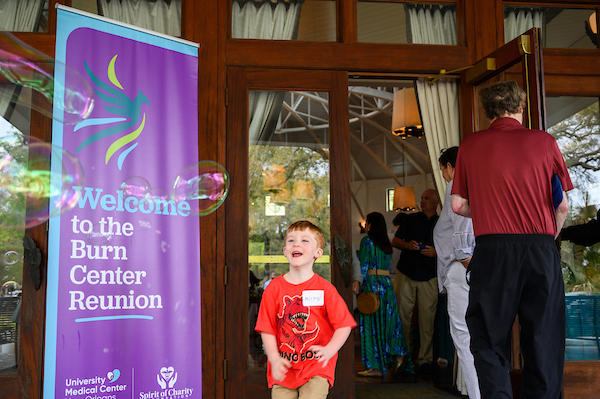 Burn survivors and UMC burn center staff together at the annual burn reunion
