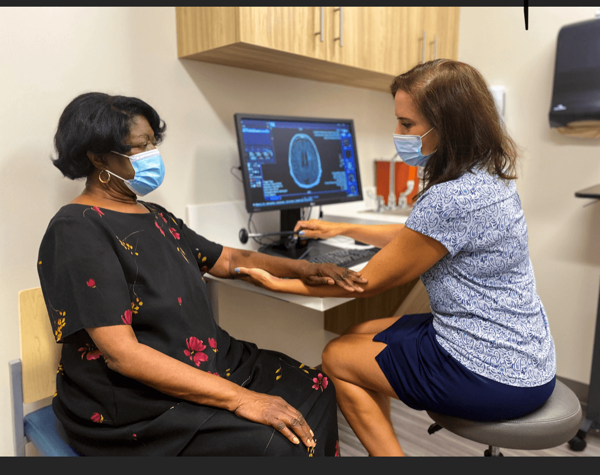 doctor running a test on a patient