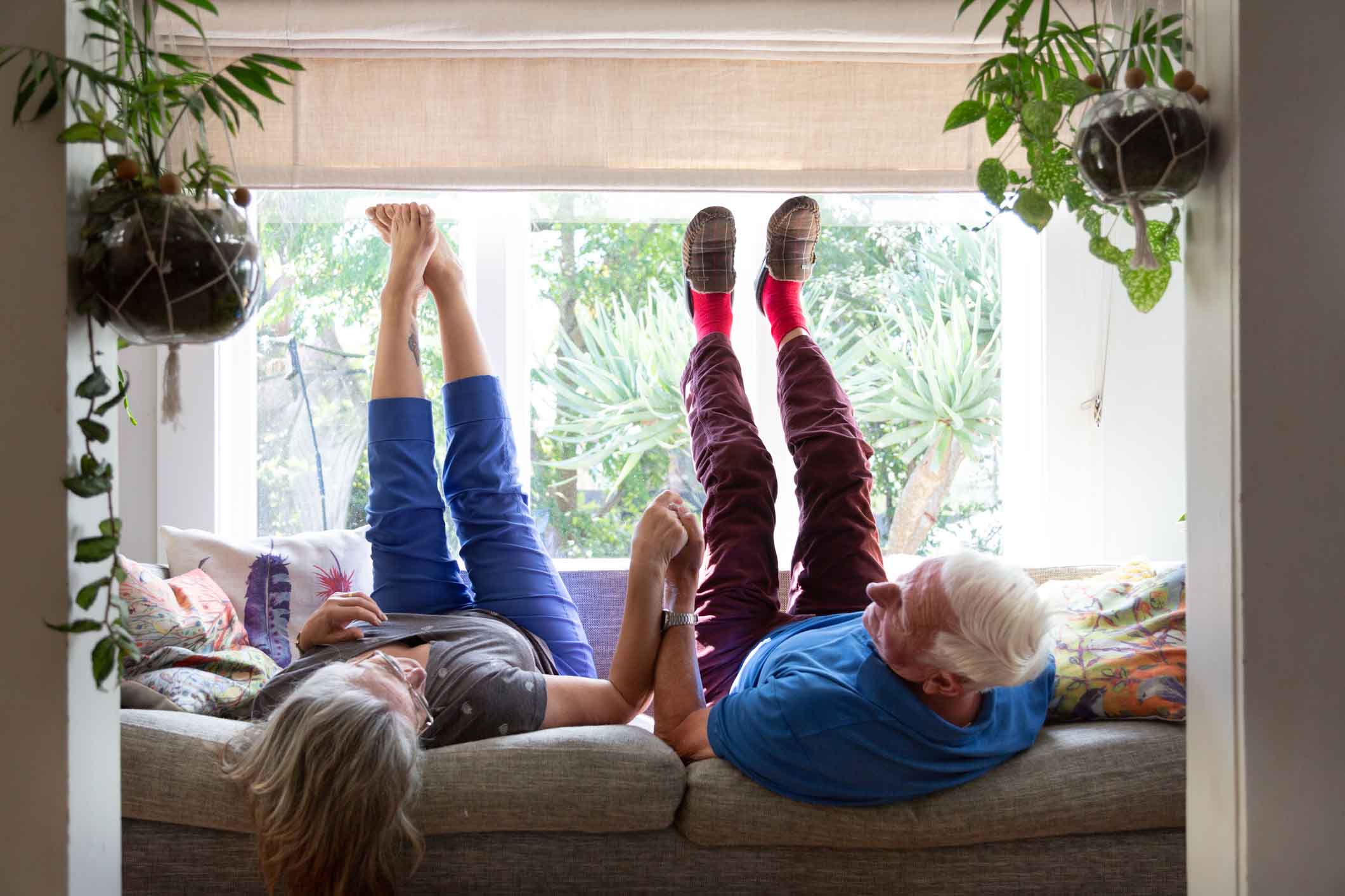 two people raising their feet