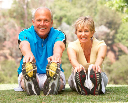 couple smiling and stretching