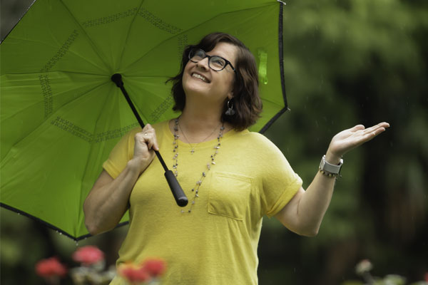 woman holding umbrella