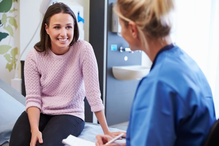 patient smiling to doctor