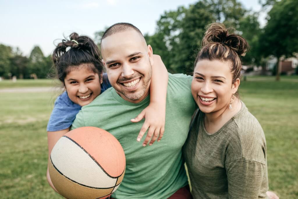 Family playing ball game