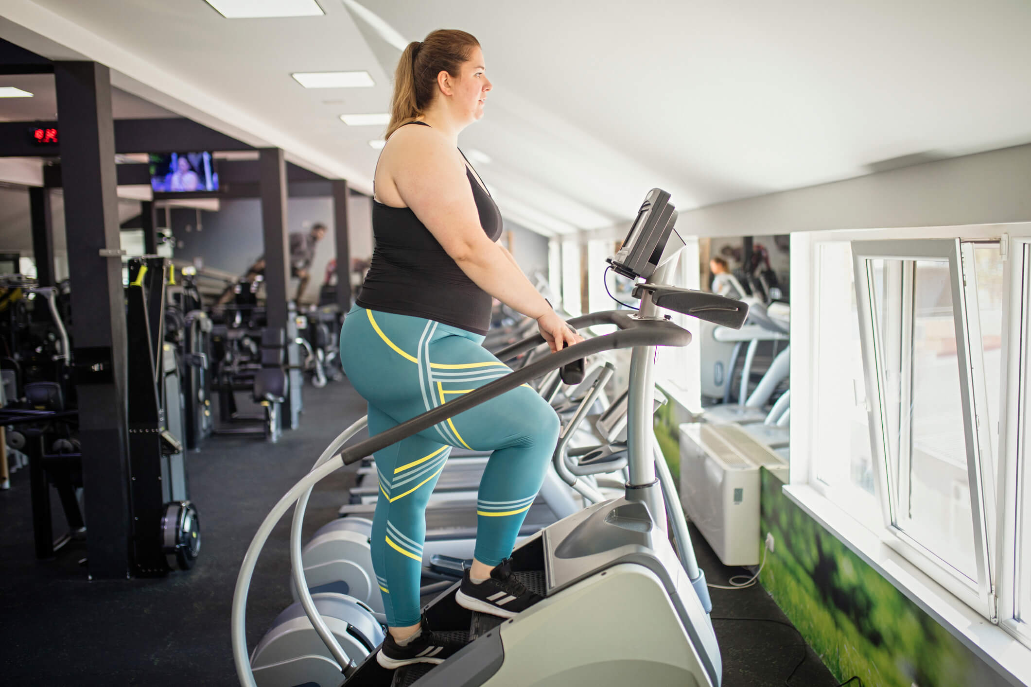 Woman using treadmill