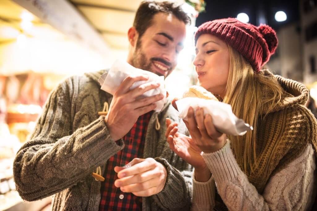 Man and woman eating