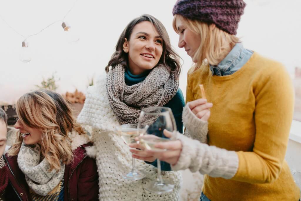 Women talking and drinking