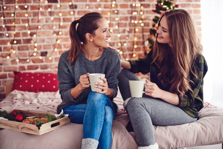 Two ladies talking over coffee