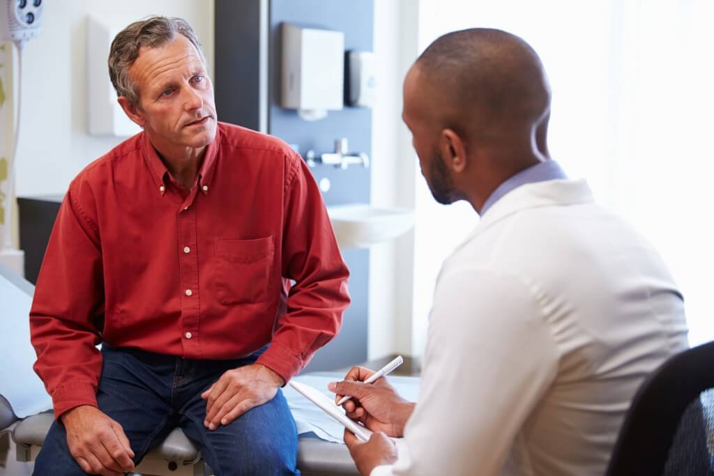 Two men talking to each other