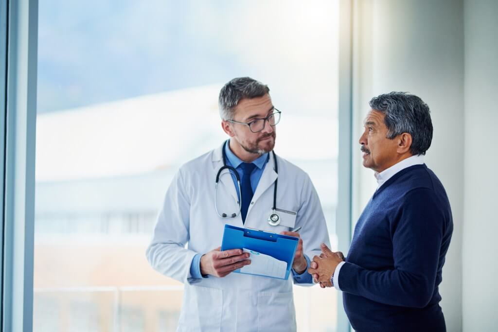 Man talking to a doctor