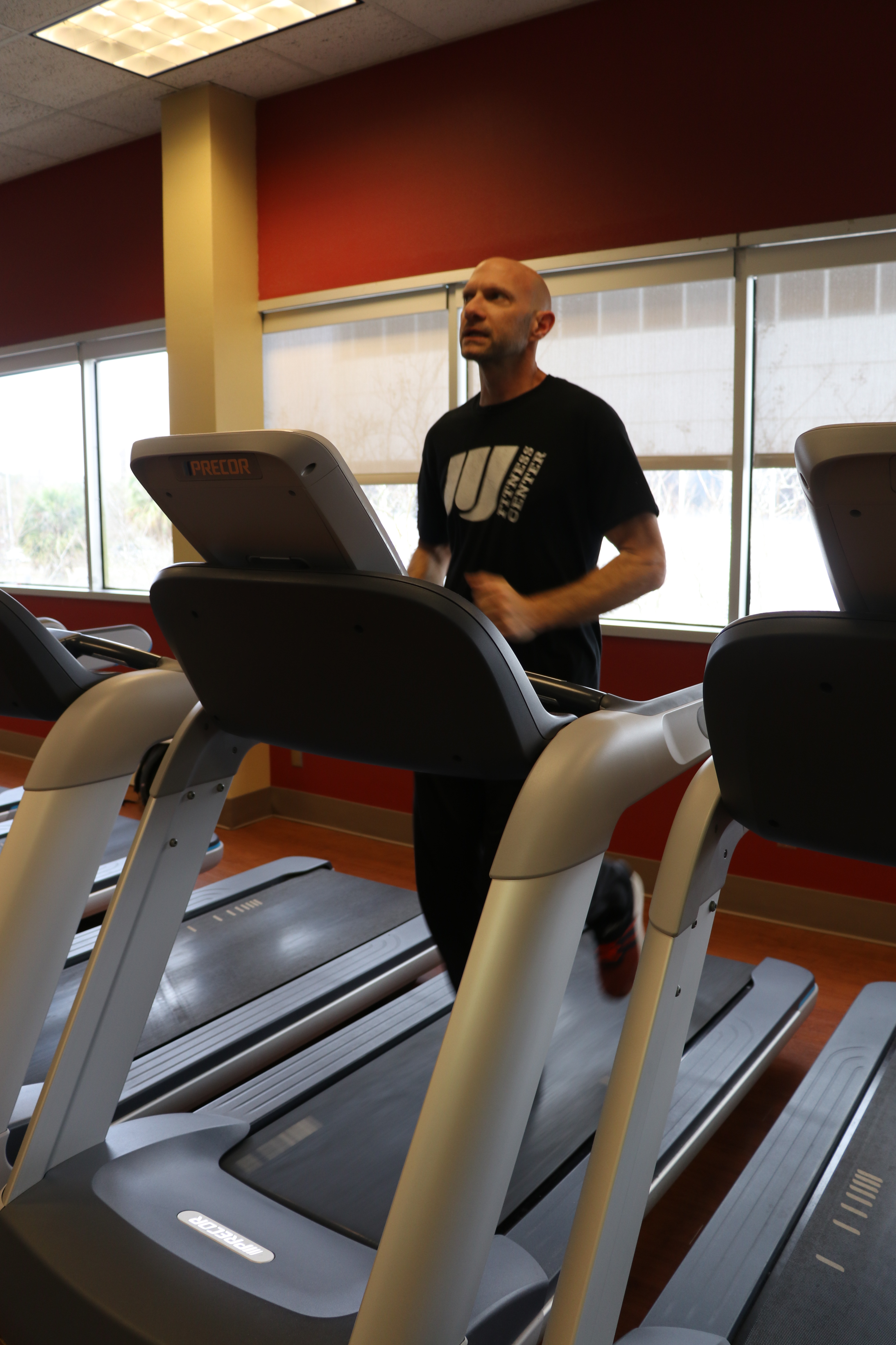 man using treadmill