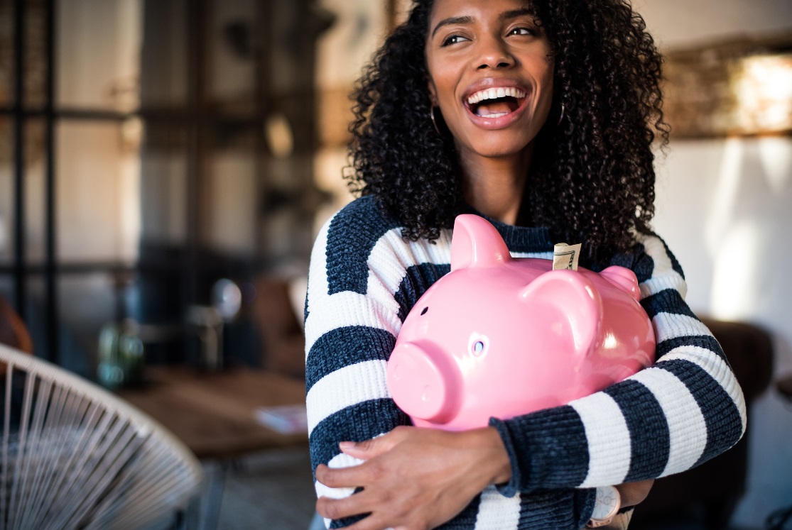 Holding piggy bank