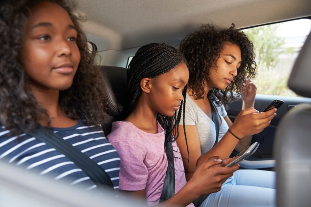 Older Children in Backseat of Car