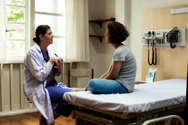 Doctor talking to patient