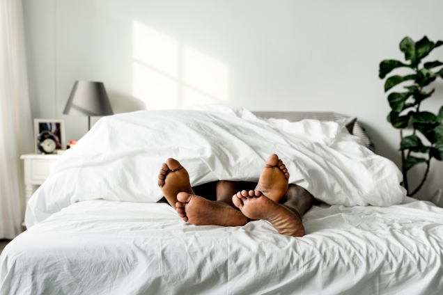 Couple of feet in bed