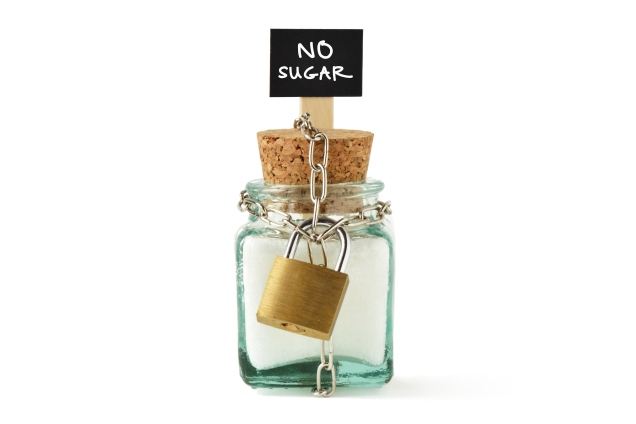 Jar with sugar, locked with "no sugar" sign