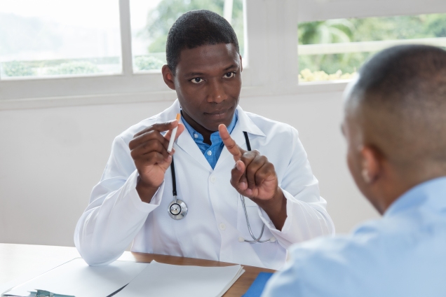 african american physician discussing smoking with patient