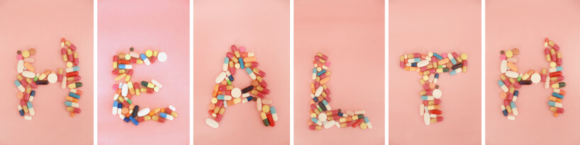 HEALTH spelled out with pills