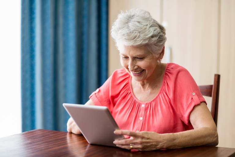 Older Woman on a Tablet like a device