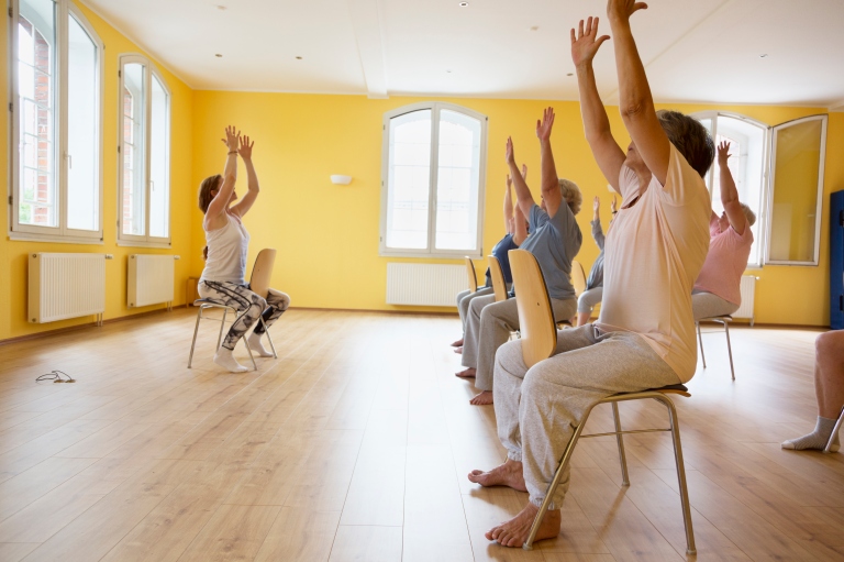 Group of older participants in an exercise class