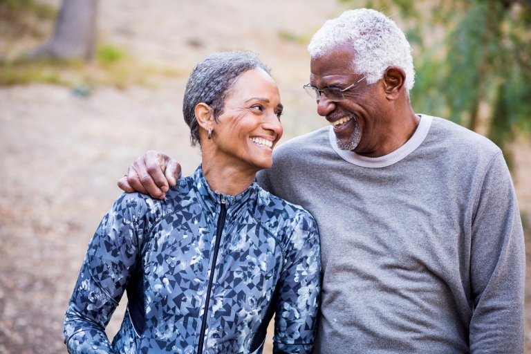 Older African American Couple outdoors smiling