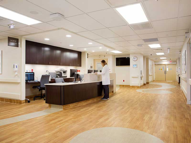 BMT center information area with a doctor standing