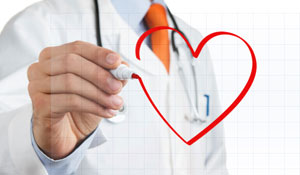 Doctor drawing a red heart