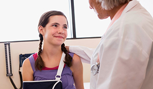 girl in cast at the doctor