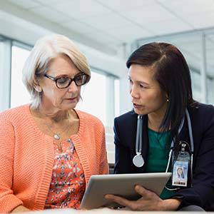 Woman speaking with healthcare provider